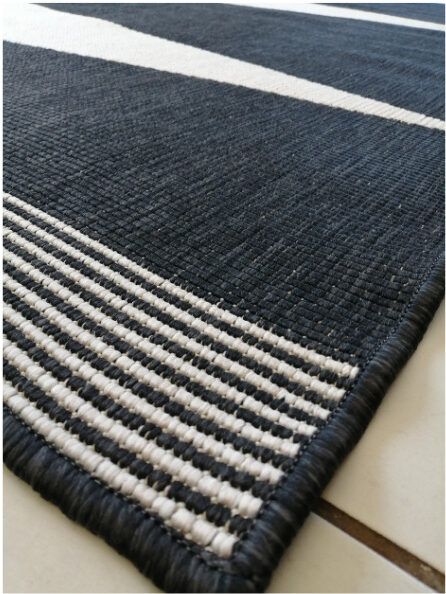 Untitled-design-2022-04-23T165842.058-e1650726186652.jpg balck white indoor rug