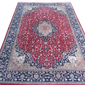 Hand knotted red Kashan Rug