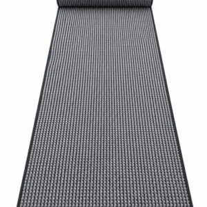 Busk Black wool runner rug rolled up on a white background
