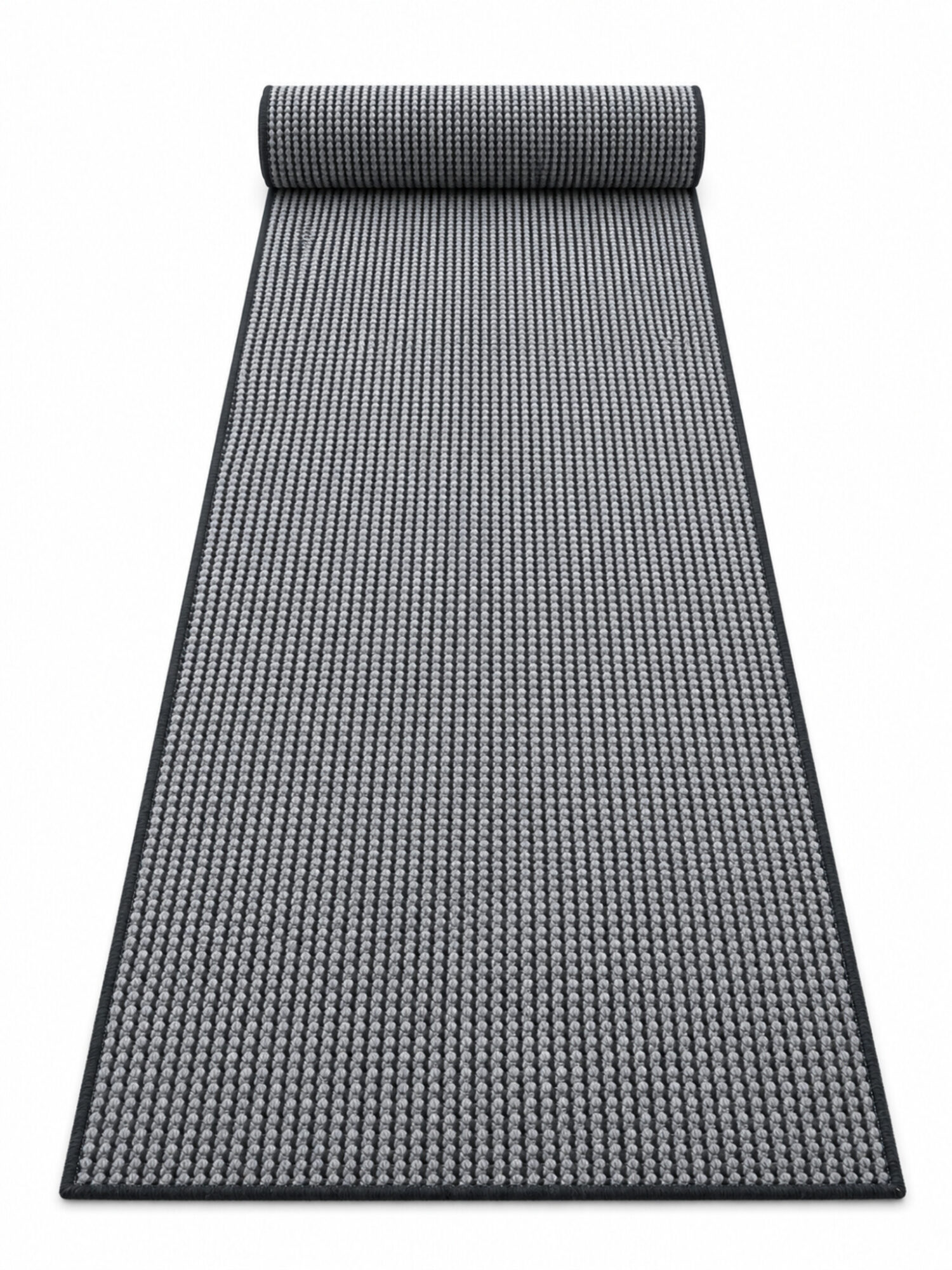 busk-black-wool-passage-runner-rug-featured-image Busk Black wool runner rug rolled up on a white background
