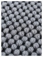 Close-up of Busk Black wool rug texture