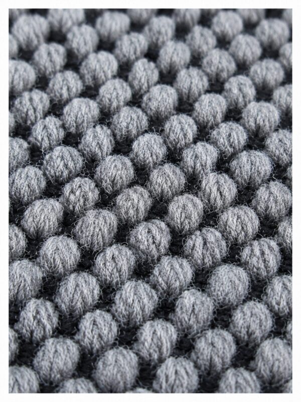 Close-up of Busk Black wool rug texture