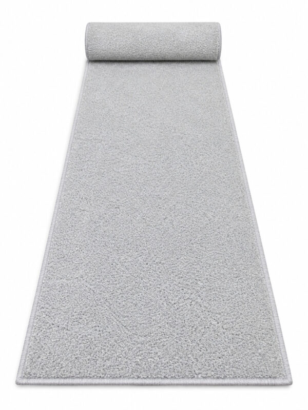 Natural Flair Pampas Grey wool runner rug rolled up on a white background