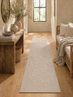 Sandstone wool runner rug styled in a hallway
