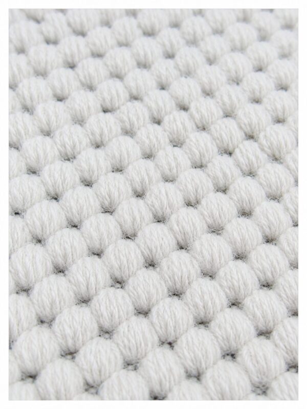 Close-up of Wool Fleece White wool rug texture