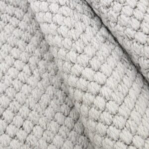Wool Twill wool rug rolled up showing texture