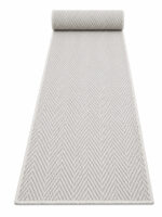 Wool Weave Herringbone wool runner rug rolled up on a white background