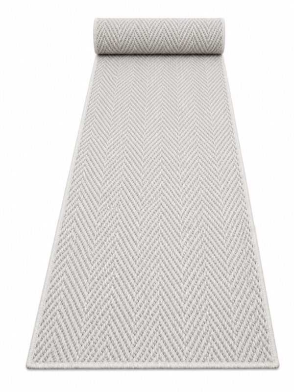 Wool Weave Herringbone wool runner rug rolled up on a white background