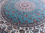 Turquoise and Red persian round carpet