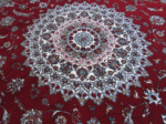 Red persian round rug